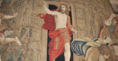 Jesus walking out of a tomb